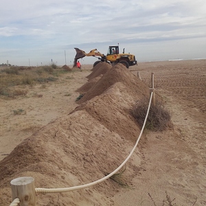 Treballs de reforç de les dunes